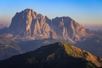 Scenic view of mountains against sky during sunset