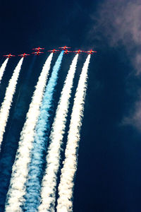 Low angle view of airplane flying in sky