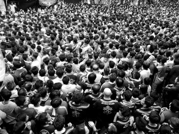 High angle view of people on street in city