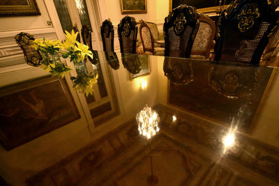 High angle view of illuminated potted plant on table at home