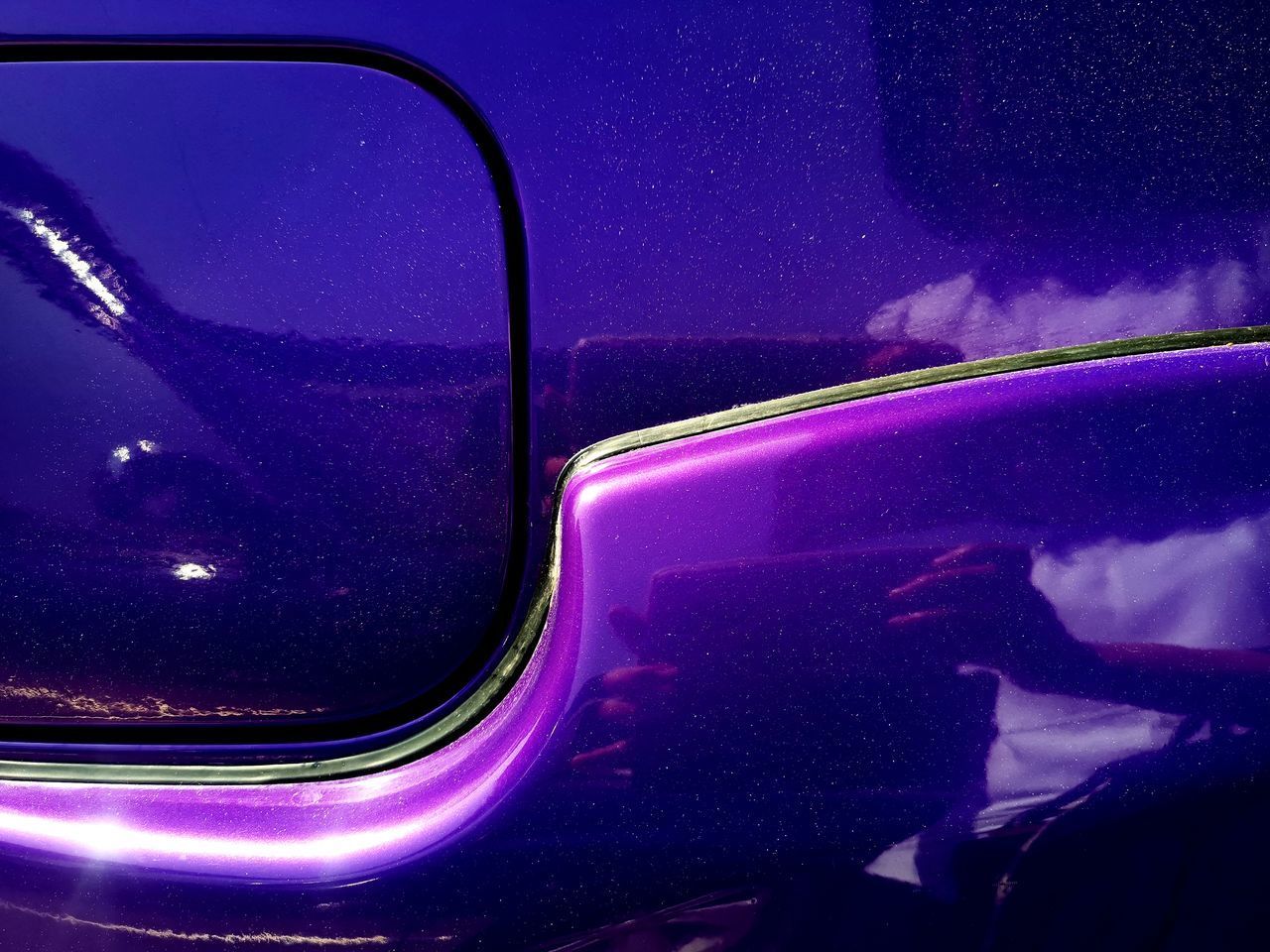 REFLECTION OF MAN IN GLASS CAR