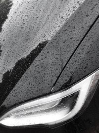 High angle view of wet car on road