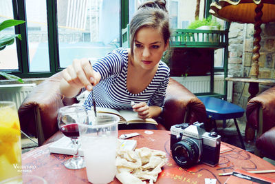 Woman sitting at restaurant