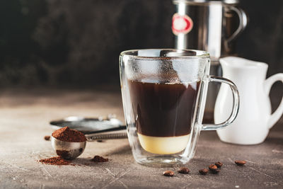 Close-up of coffee cup on table