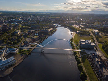 High angle view of river amidst buildings in city