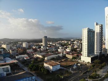 High angle view of buildings in city against sky