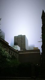 Low angle view of buildings against clear sky