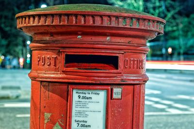 Close-up of letter holder on street