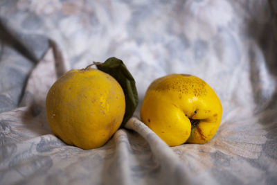 Close-up of oranges on table