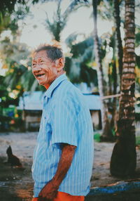 Portrait of smiling man against the sky