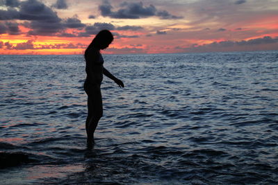 Silhouette of person on beach