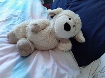 High angle view of stuffed toy on bed at home