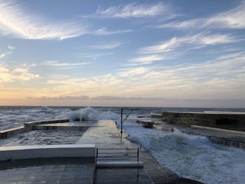 Scenic view of sea against sky during sunset