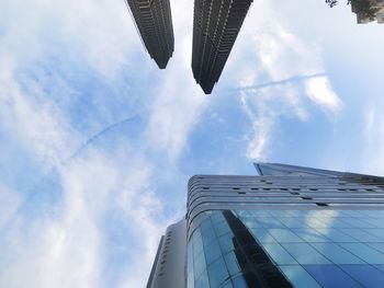 Low angle view of skyscraper against sky