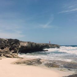 Scenic view of beach against sky