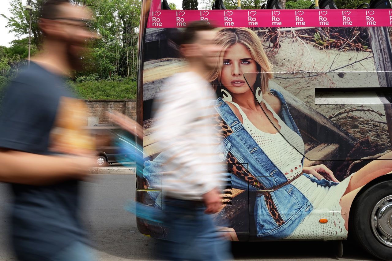 Transportation, real people, young adult, young women, casual clothing, blurred motion, mode of transport, lifestyles, standing, leisure activity, bus, street photography, rome, movement, walking, flaneur, strolling