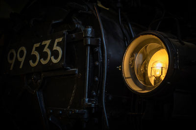 Close-up of illuminated lighting equipment