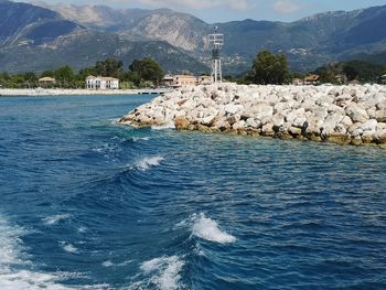 Scenic view of sea against mountain