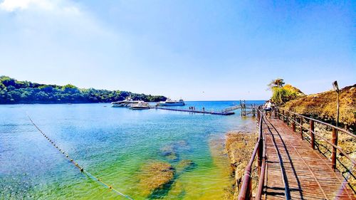 Scenic view of sea against clear blue sky