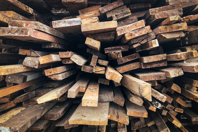 Stack of reused wooden bars in different sizes.