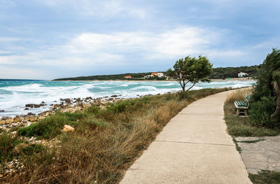 Scenic view of beach against sky