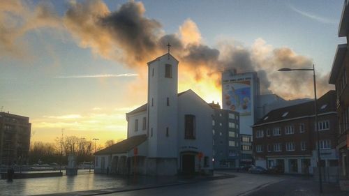 View of buildings at sunset