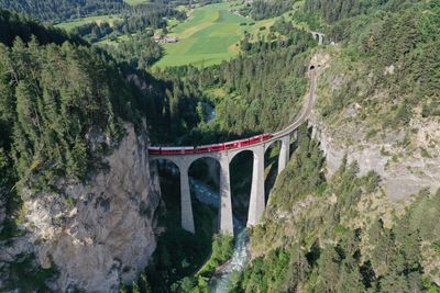 Arch bridge over mountains