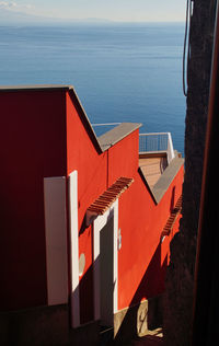 High angle view of residential building against sea