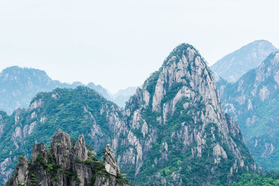 Panoramic view of mountain range against clear sky