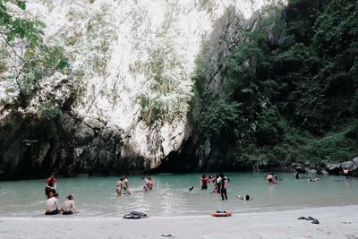 Group of people enjoying in the sea