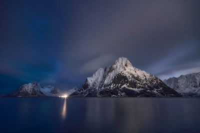 Scenic view of snowcapped mountains against sky during winter