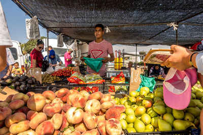 Various fruits for sale at market stall