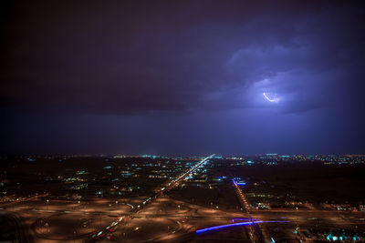 Illuminated cityscape at night