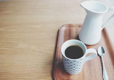 Close-up of coffee cup on table