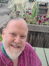 Close-up portrait of a smiling young man