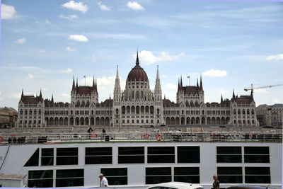 Buildings in city against sky