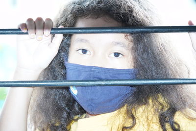 Portrait of man holding camera