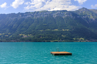 Stunning swiss alpine lake at interlaken, switzerland, pure and crystal-clear water