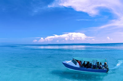 Boat in sea against sky