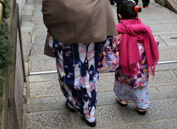 Low section of people standing outdoors