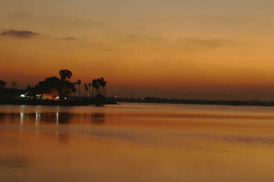 Scenic view of sea at sunset