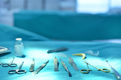 Close-up of surgical equipment on table