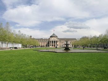 Built structure with lawn in foreground