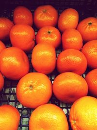 Full frame shot of oranges at market stall