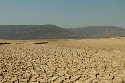 Scenic view of desert against sky