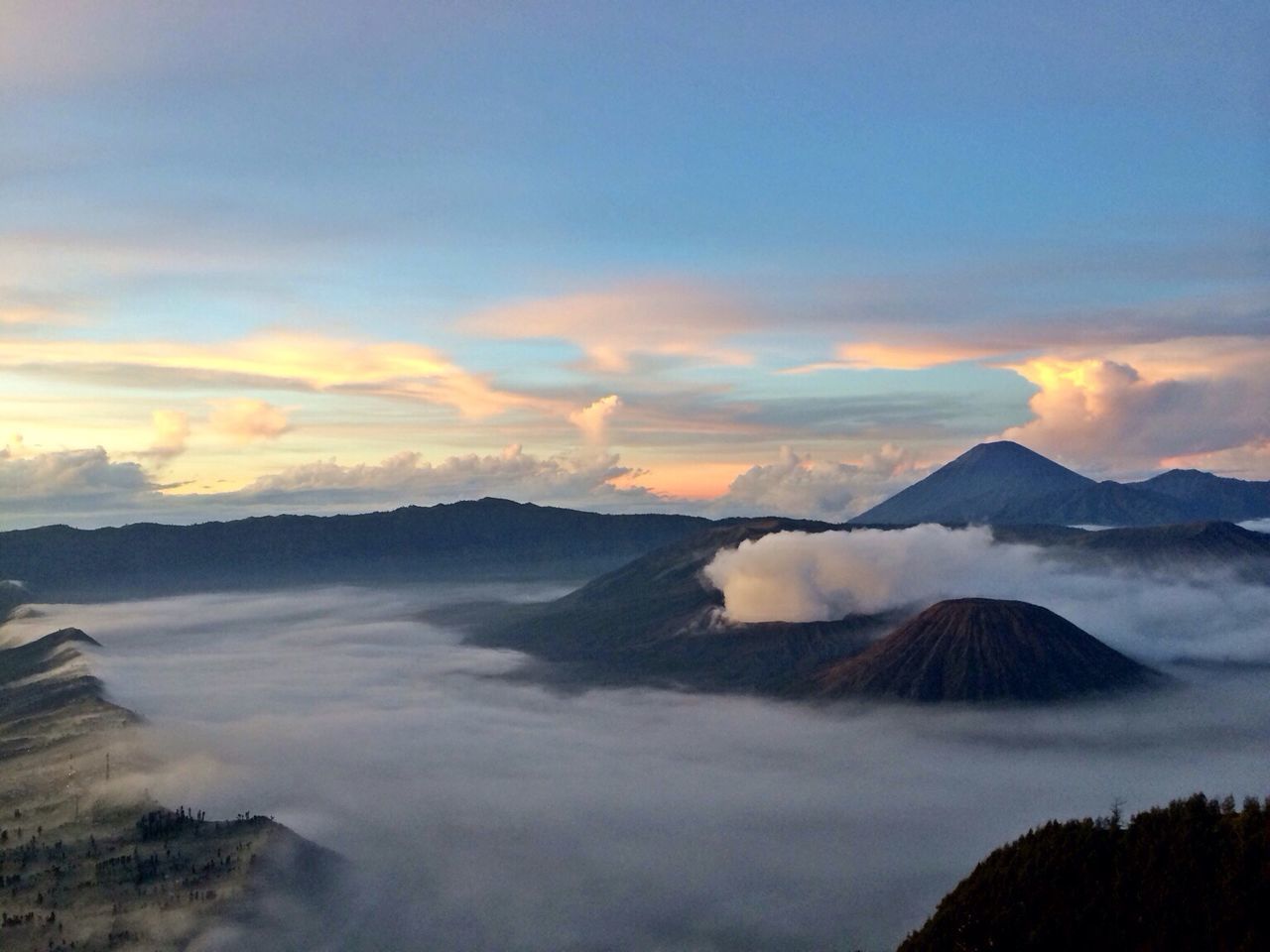 scenics, tranquil scene, mountain, beauty in nature, tranquility, sky, sunset, cloud - sky, mountain range, nature, idyllic, landscape, weather, non-urban scene, cloud, majestic, fog, orange color, no people, outdoors