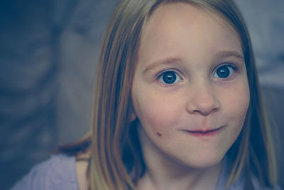 Close-up portrait of smiling girl