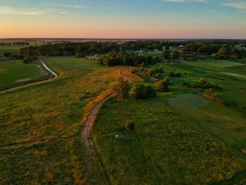 Scenic view of landscape against sky during sunset