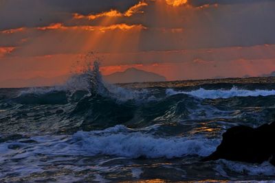 Scenic view of sea at sunset