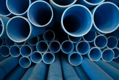 Close-up of pipes against blue sky